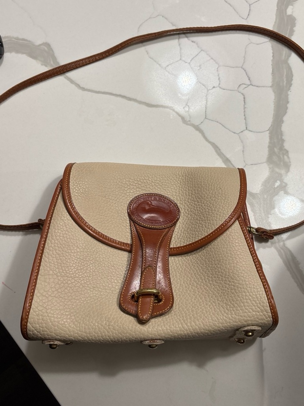 Vintage Dooney & Bourke Leather-Trim Cream Crossbody Bag with Brown Accents
